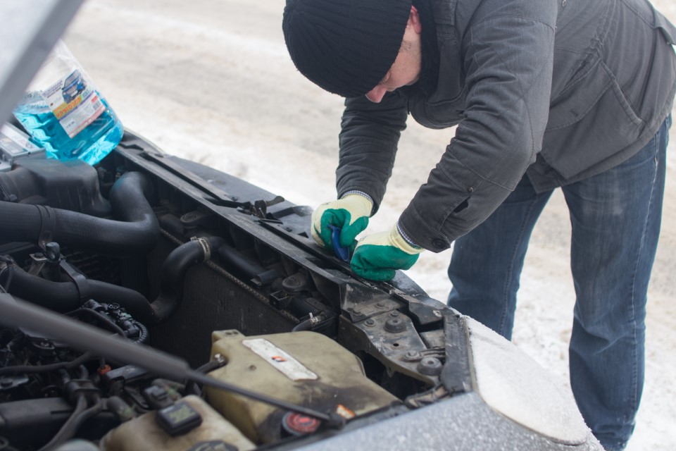 man-repairing-a-car-in-winter-ways-start-diesel-engine-cold-heater-parts-power-performance